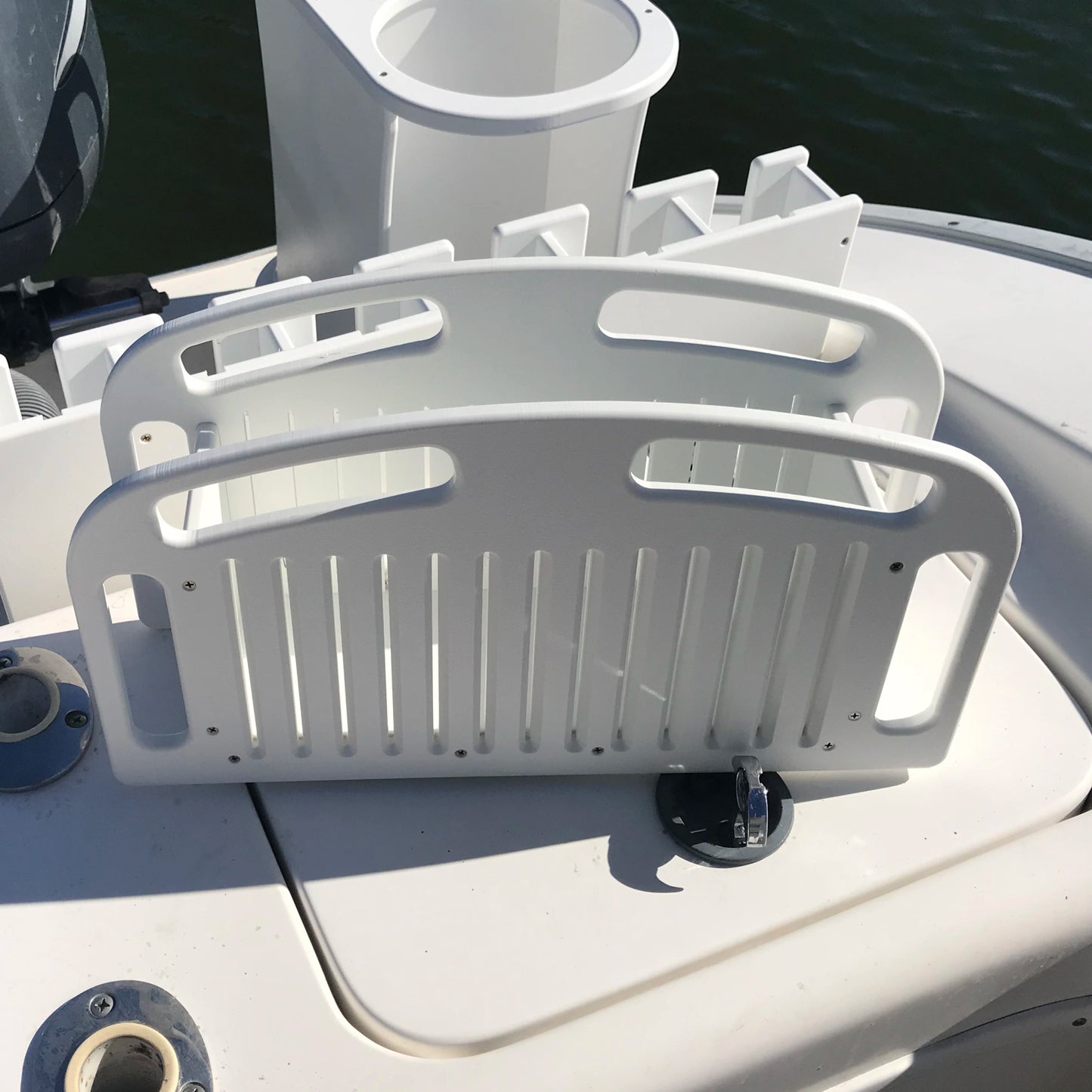 Get the ChumBuster! Cut up your chum or bait into 1 inch slices quickly, easily, and safely. Featuring knife slots spaced 1 inch apart to cut bait and chum quick. Handles to easily carry chopped bait around the boat. Optional rod holder mount. Makes cutting chum safer and easier, especially in rougher waters, than a flat cutting board.